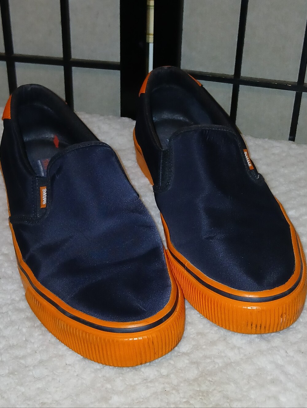 Swims Black & Orange Slip-On Sneakers